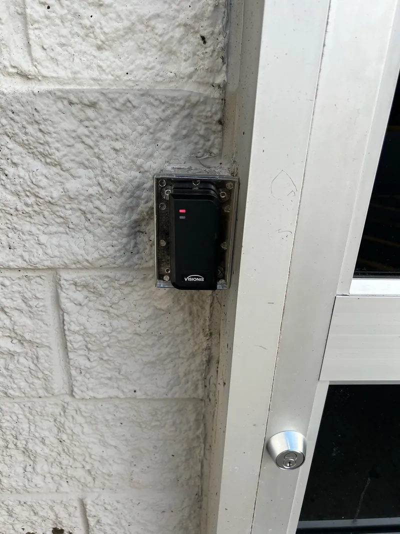 Commercial access control reader installed at a retail location
