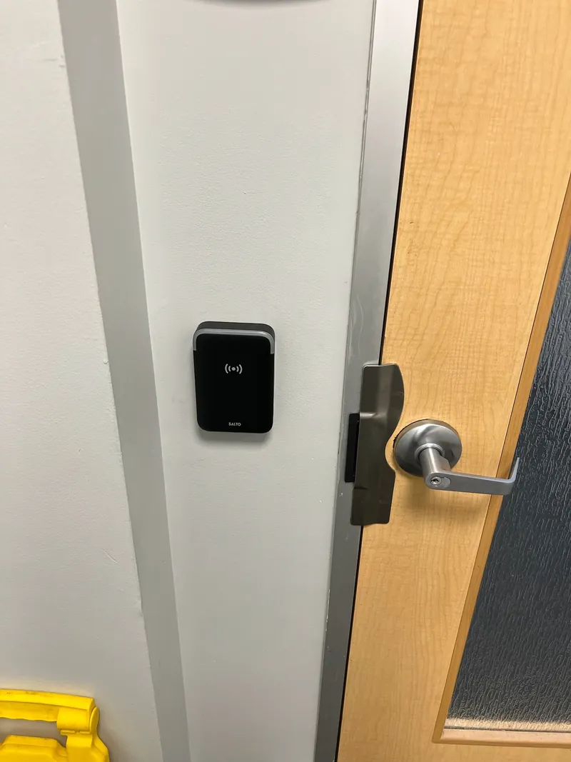 SALTO access control reader installed at a commercial coworking facility