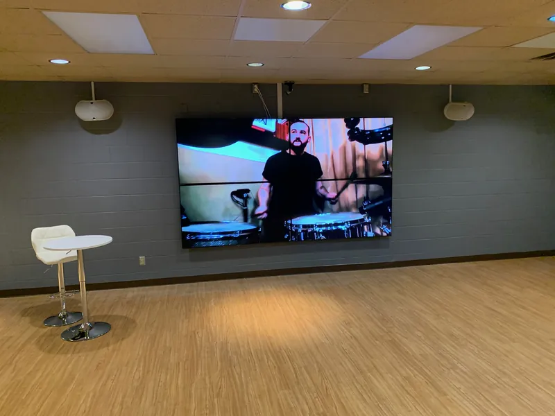 LCD video wall and audio conferencing system installed for a corporate Zoom Room