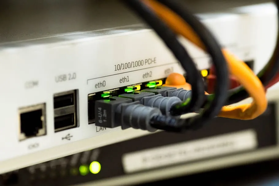 Close-up of network appliance Ethernet ports with patch cables connected