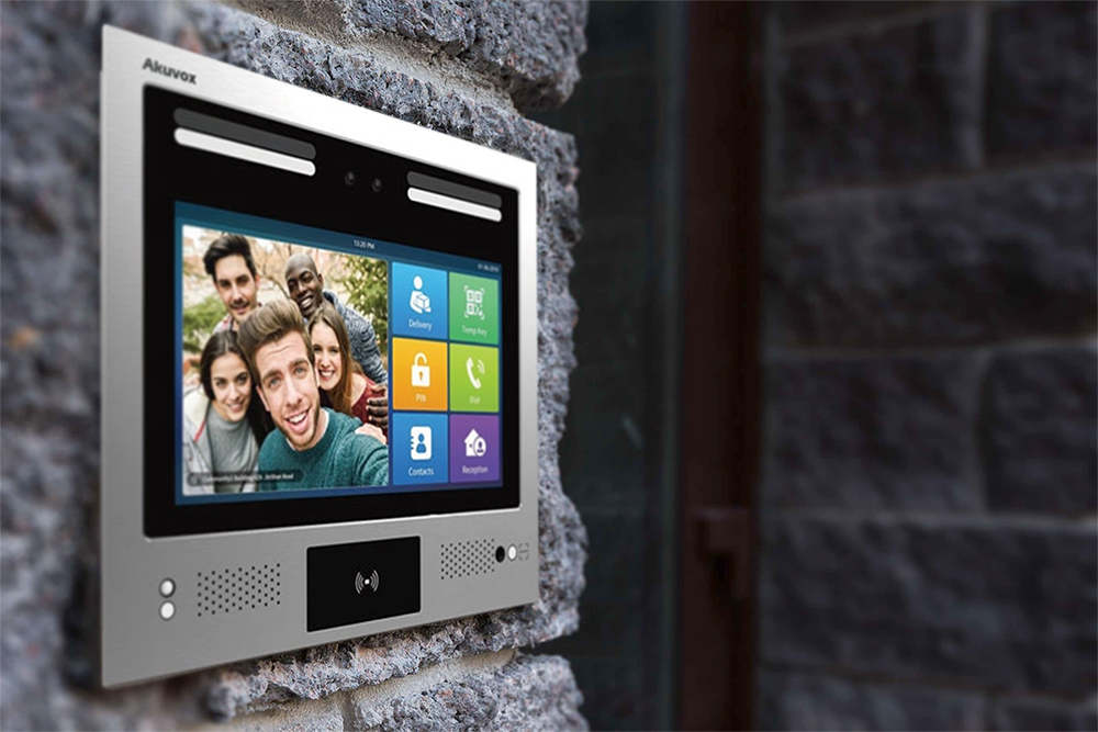 Commercial video intercom integrated at a secured building entrance